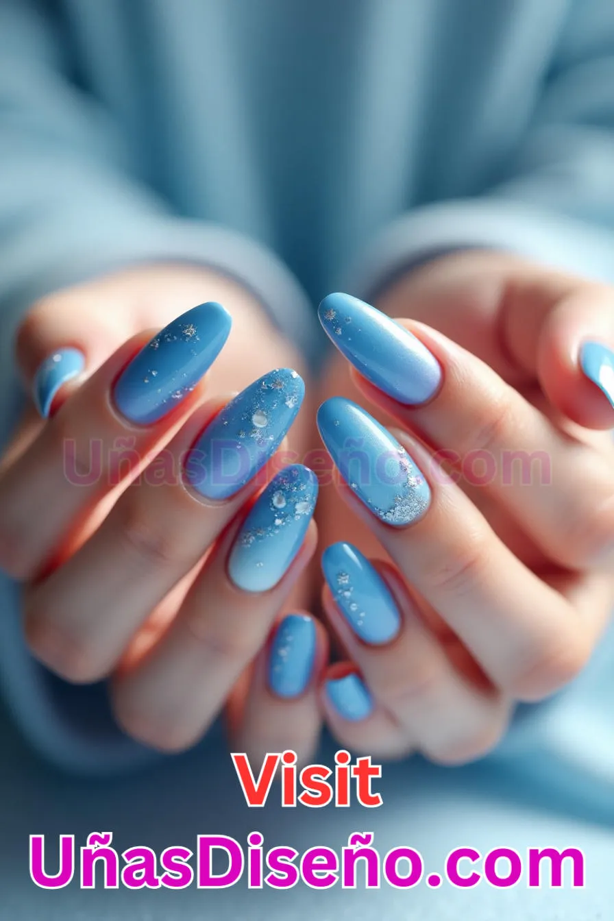 1. Resplandor celeste - Tendencias 2025 30 Estilos de Uñas Almendra que Marcan la Diferencia (1).jpeg