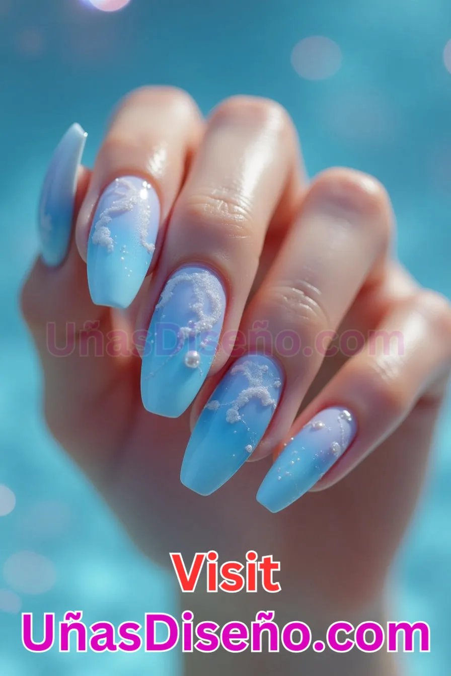1. Resplandor celeste - Tendencias 2025 30 Estilos de Uñas Almendra que Marcan la Diferencia (8).jpeg