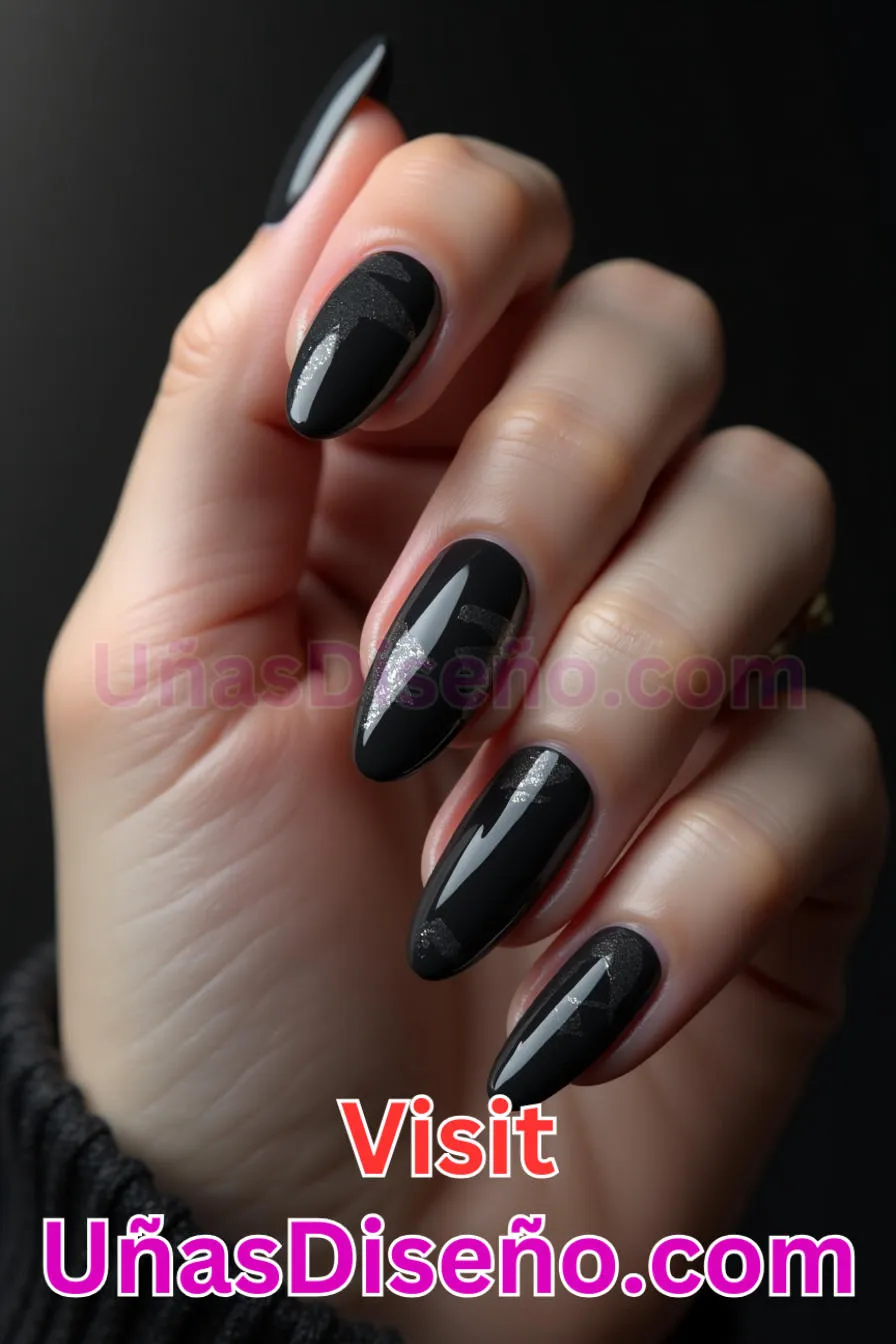 23. Edgy Blackout Vibes - Tendencias 2025 30 Estilos de Uñas Almendra que Marcan la Diferencia (1).jpeg