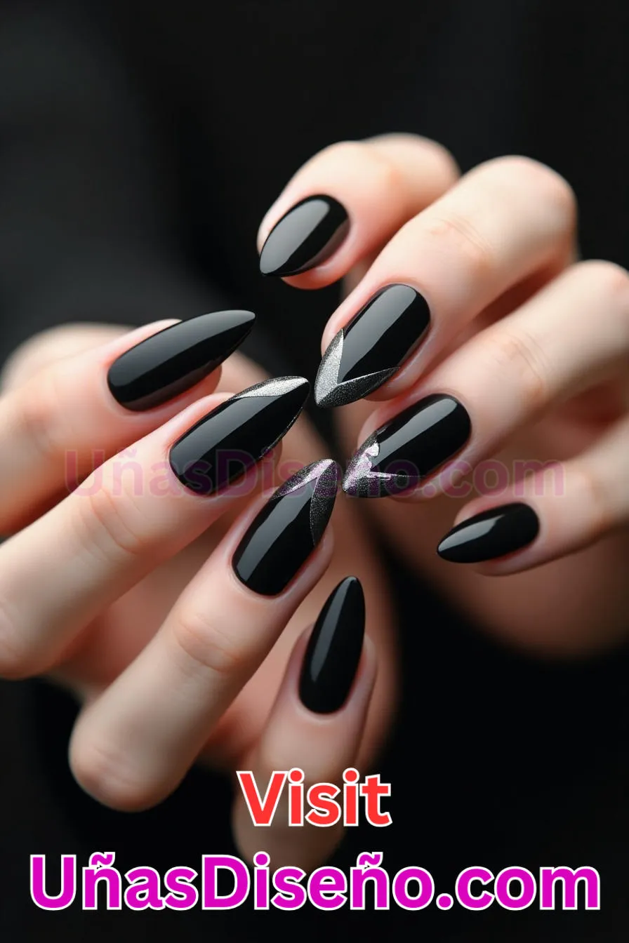 23. Edgy Blackout Vibes - Tendencias 2025 30 Estilos de Uñas Almendra que Marcan la Diferencia (3).jpeg